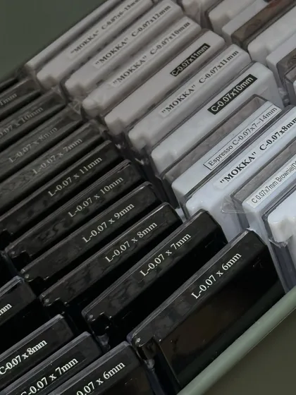 A look at our wide selection of eyelash extension trays. We have various curls, lengths, and colors like "Mokka" and black to customize your look perfectly.