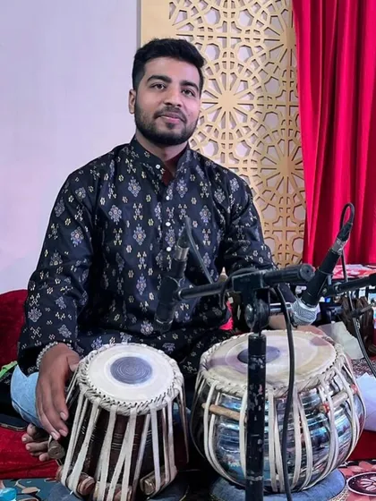 Ready to perform at the mehfil with sarangi accompaniment.