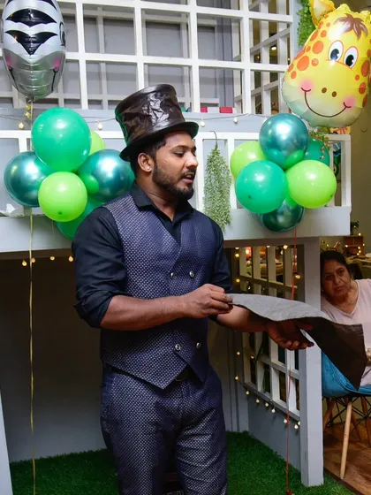 Do you believe in magic? Our magician getting his show started, ready to wow the crowd.