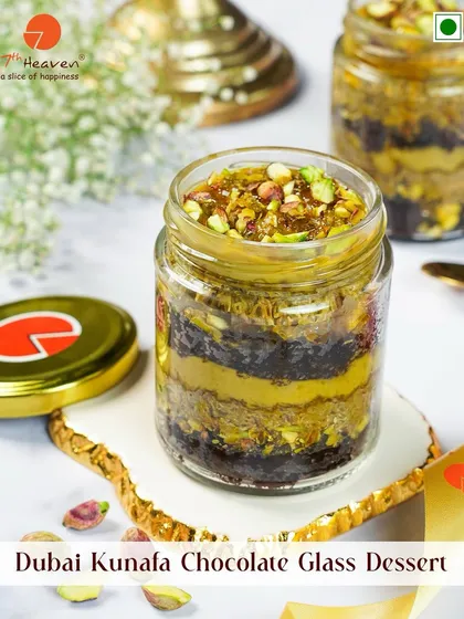 Introducing our Dubai Kunafa Chocolate Glass Dessert. This jar dessert features layers of rich chocolate, crunchy pistachios, and crispy kunafa pastry.