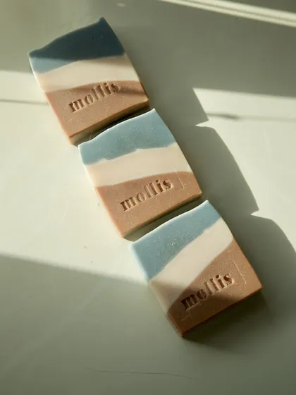 The natural, earthy colors of these bars are created with clays and botanicals.