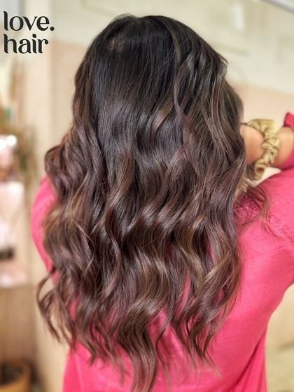 A close-up of our 'flavour of the week' balayage, showing the rich texture and subtle dimension of the chocolatey brown tones.