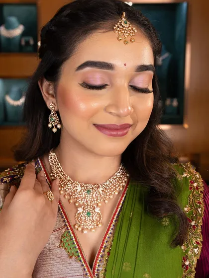 A soft, romantic makeup look with pink eyeshadow and a matching lip, created for a jewellery photoshoot. The look is dreamy and feminine.