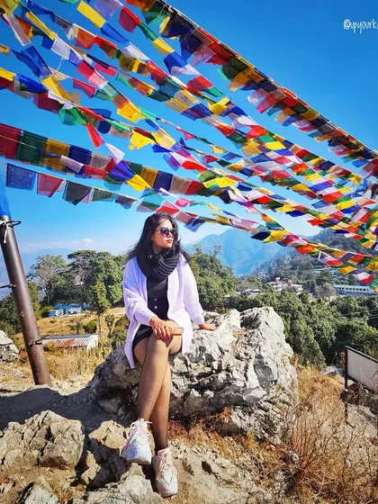 Your style should match your adventure. Here in the mountains, surrounded by prayer flags, the look is about being comfortable, practical, and chic. I create vacation wardrobes that are ready for any backdrop.