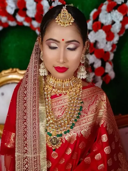 A close-up showing the detailed eye makeup with a soft shimmer, which adds a modern touch to the traditional look.