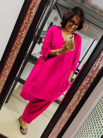 You can't beat a comfy linen salwaar kameez, and this one has pockets. I paired this bright pink set with my favorite juttis for a look that's both stylish and easy to wear.