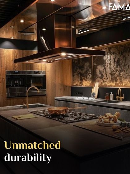 Unmatched durability is a guarantee with M-Core™. This kitchen showcases a powerful aesthetic with a copper-finished chimney hood and textured backsplash, all supported by our robust and resilient cabinet and countertop material.