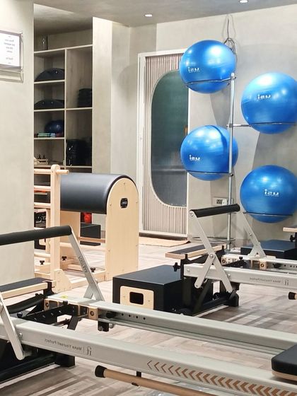 Our studio is equipped with everything you need for a varied practice. This includes reformers, stability balls, and spine correctors, all kept in pristine condition.
