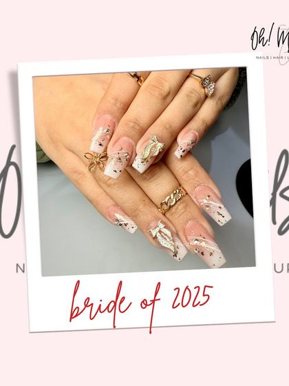 Say 'I do' with perfect nails. This bridal design features long, square-tipped nails with intricate 3D butterfly charms and scattered glitter, perfect for a 2025 bride.