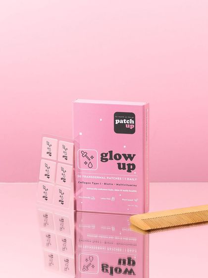 Pink on pink with a touch of reflection. This shot uses a mirrored surface to create a sleek, elegant feel for these 'glow up' patches, while the comb prop adds a relevant, real world context.