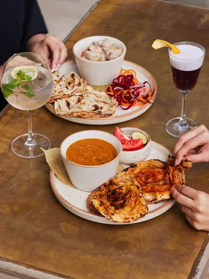 Why choose when you can have it all? Our tables are meant for sharing, with plates of comforting dal makhani and creamy malai chicken, perfectly paired with our signature cocktails.