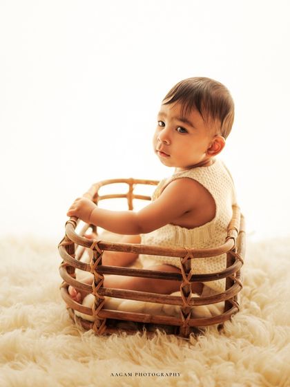 Using a simple rattan basket as a prop in the high-key setup adds a touch of natural texture while keeping the look clean and bright.