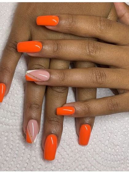 A bright and bold set of orange square-shaped extensions with a simple, elegant line art accent nail.