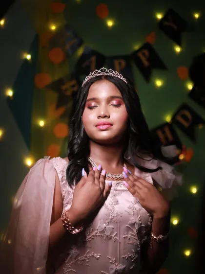 A dramatic shot of the birthday girl, feeling her princess moment.