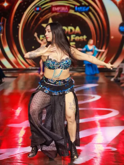 Freezing the energy of a live belly dance performance at IMODA Fashion Fest. My goal is to capture the dynamic movement and vibrant atmosphere of every performance, adding another layer to your event's story.