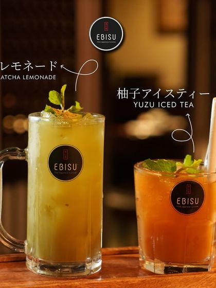 A duo of our Japanese-inspired mocktails. On the left is the earthy Matcha Lemonade, and on the right is the zesty and sweet Yuzu Iced Tea.