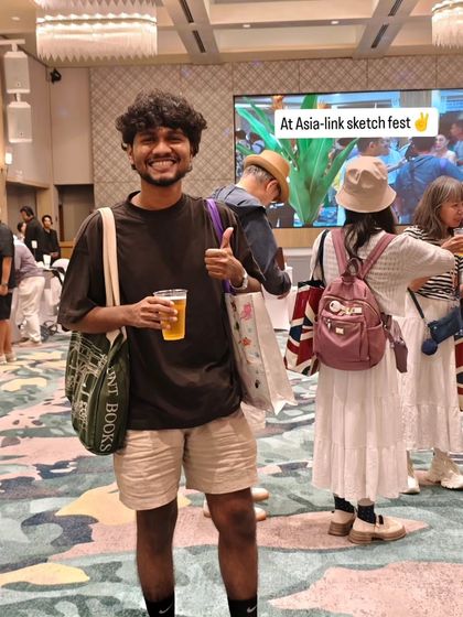 My happy world. A photo of me at the Asia-link Sketch Fest in Phuket, enjoying the creative atmosphere.