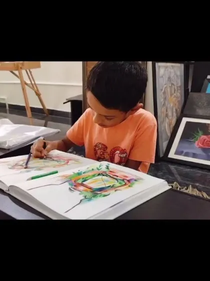 Another young student practicing his drawing skills, demonstrating the foundational techniques we teach.