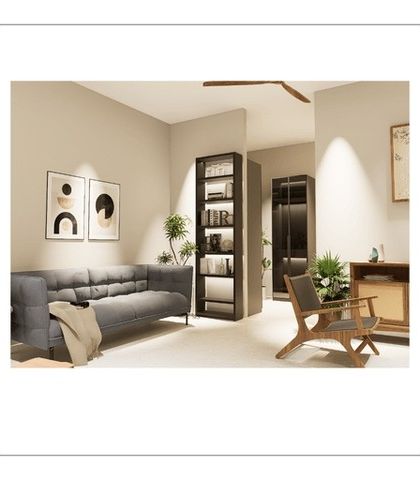 Another view of a seating area in an ALTURA residence. The combination of a comfortable sofa, minimalist artwork, and carefully placed plants creates a space that feels curated yet livable.