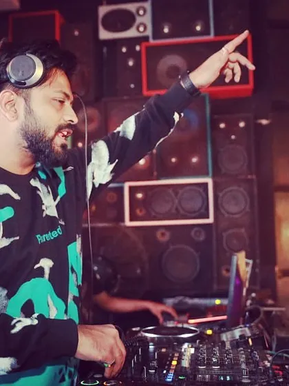 In action at Bombay Adda, fully engaged with the music and the audience. My job is to lead the party from behind the decks.