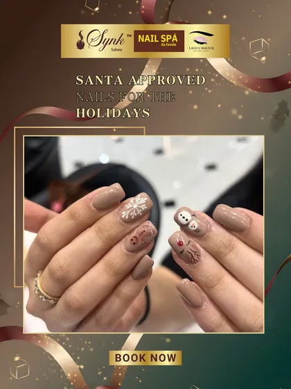 A cute and charming Christmas nail design. This set features adorable hand-painted snowmen and reindeer on a neutral base, bringing a touch of holiday cheer to your fingertips.