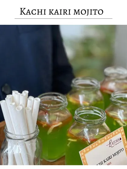 A seasonal favorite, the Kachi Kairi Mojito. This raw mango mojito is tangy, sweet, and incredibly refreshing, served here in rustic mason jars.