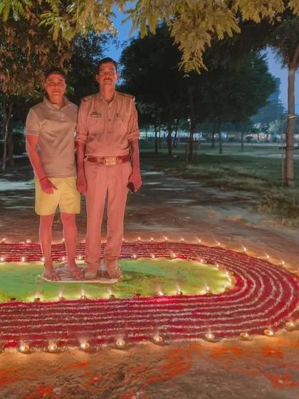 Posing with a student on our handmade running track rangoli. Fitness is a celebration of life.