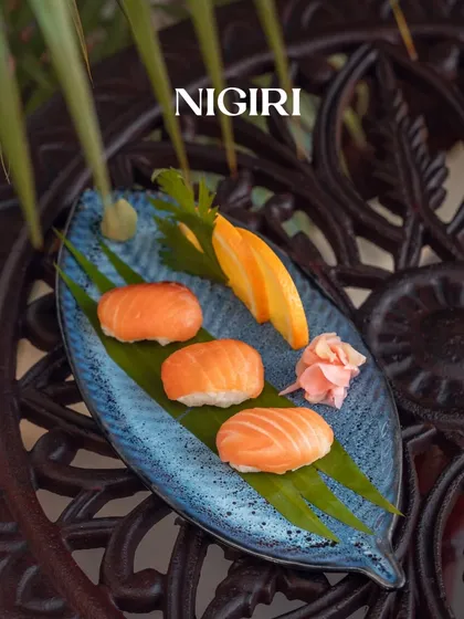 A plate of our classic Nigiri, where buttery salmon rests on perfectly seasoned rice.