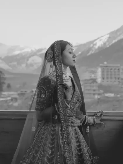A bridal portrait should be a timeless piece of art. Here, against the majestic mountain backdrop, the bride's quiet strength and grace are the entire story.