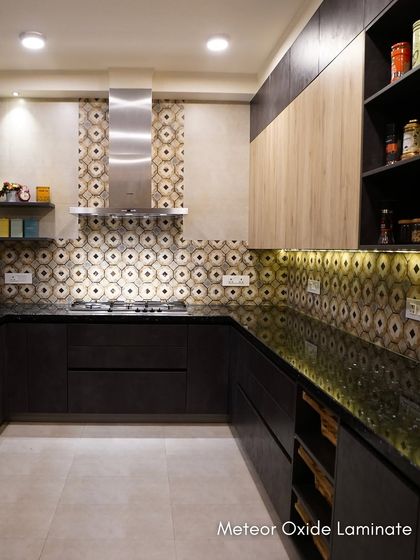 The U-shaped layout of Esha Bahl's kitchen provides an efficient work triangle, with everything needed for Indian cooking easily accessible.