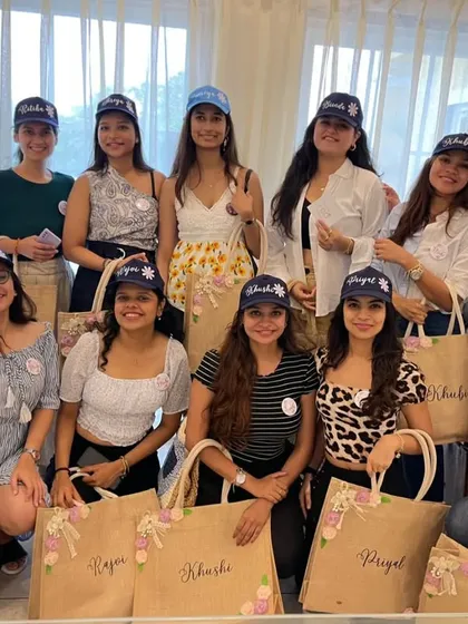 For a beach bachelorette party, I created these custom jute bags and caps for the entire bride tribe. It's a fun and practical gift that brings the whole squad together and makes for amazing photos.