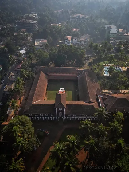 An aerial shot of the historic Sawantwadi Palace in the heart of Konkan. This demonstrates my ability to capture architectural marvels within their natural landscape, providing a unique perspective on Maharashtra's hidden gems.
