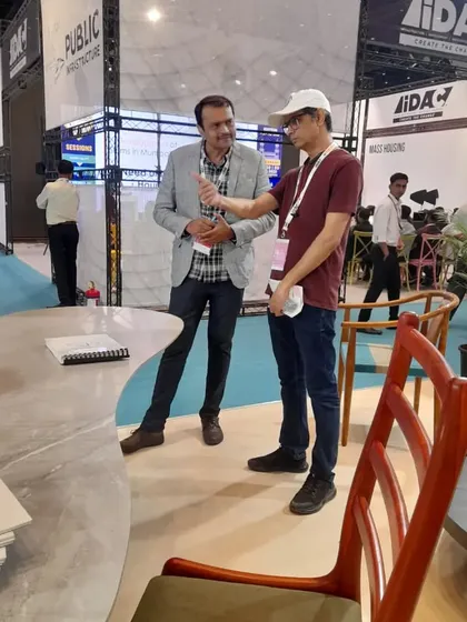 Answering questions from a journalist or blogger at the iDAC exhibition. Sharing my passion for furniture making is an important part of what I do.