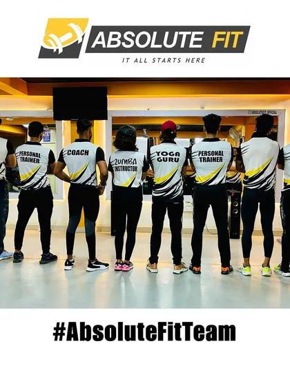 A look at our team from behind, showcasing the different roles we play in your fitness journey. From 'Personal Trainer' to 'Yoga Guru' and 'Zumba Instructor', we have a specialist for every need.