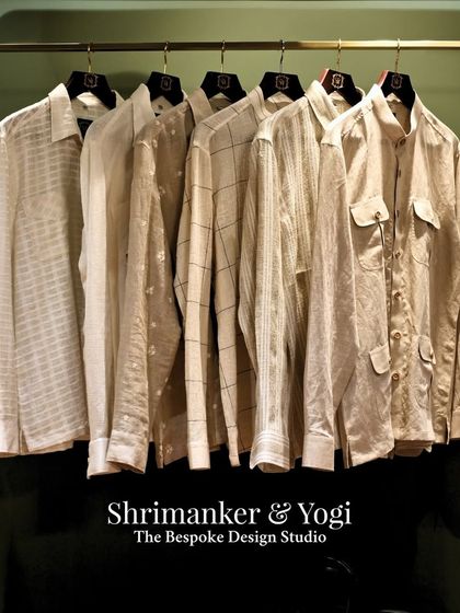 Another view of our neutral-toned shirts, perfect for pairing with more elaborate jackets or wearing on their own for a relaxed yet refined festive look.