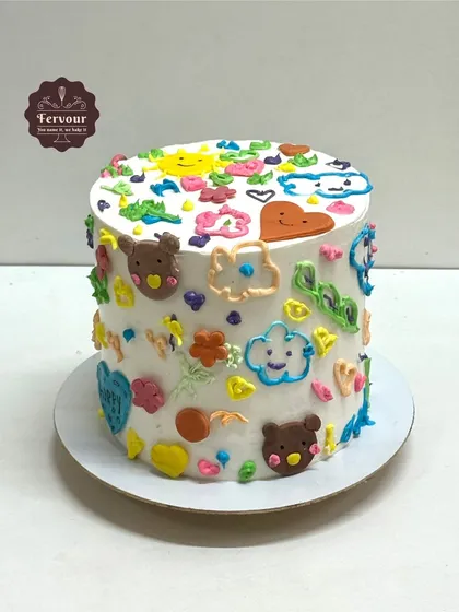 A fun and colourful doodle cake. This chocolate truffle butterscotch crunch cake is covered in cute, hand-piped doodles, creating a playful and unique design.