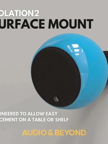 The Gallo Acoustics Isolation2 surface mount allows for easy placement on any table or shelf. This image shows the vibrant blue speaker, demonstrating how its design combines stability with a minimal footprint for clean, modern installations.