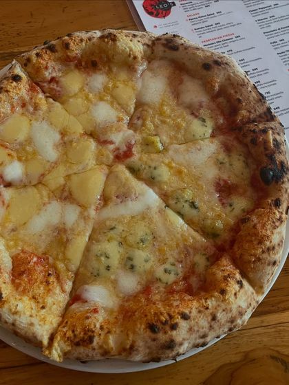 A half-and-half pizza for the ultimate cheese lover. One side Quattro Formaggi, the other something just as cheesy.