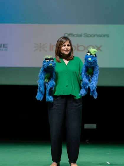 Sometimes one puppet isn't enough. Here I am with two of my blue monster puppets, ready to cause double the trouble and get double the laughs.