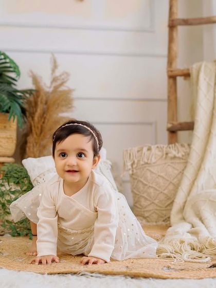 On the move. Capturing these early crawling moments is a key part of milestone photography, preserving the memory of their first explorations.