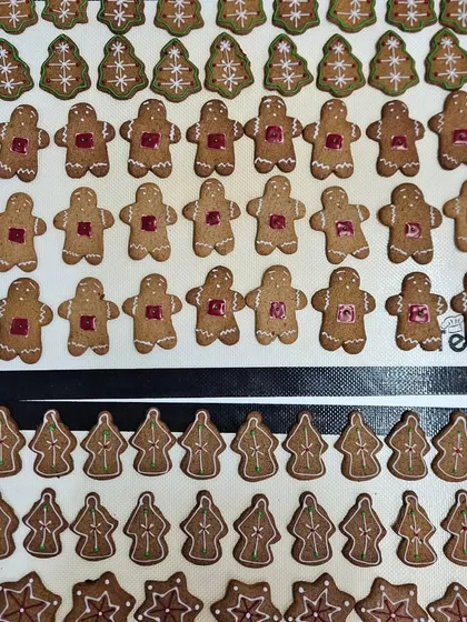 A snapshot from our kitchen during the Christmas season. We were busy baking hundreds of gingerbread cookies in all shapes and sizes, from gingerbread men and Christmas trees to festive stars.