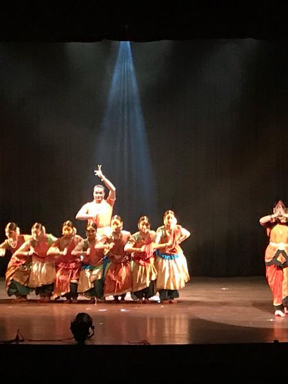 The finale of 'Akhandalaya', with me in a gesture of prayer while my troupe forms a supportive base. This tableau represents the culmination of our rhythmic journey.