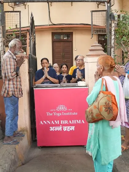 People gathering with gratitude at our Annam Brahma food distribution point. The spirit of respect and thankfulness is a beautiful part of this seva.