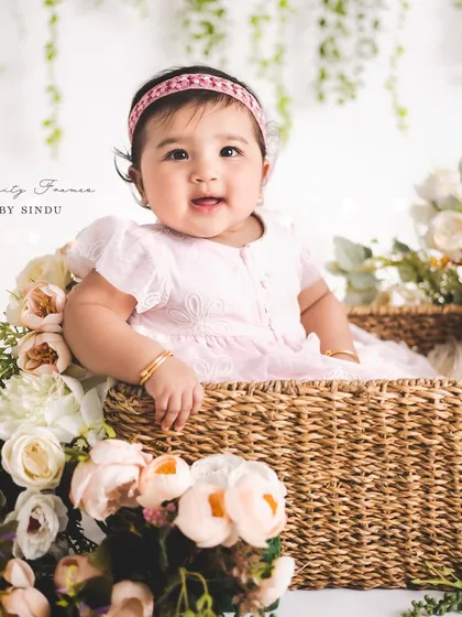 Another beautiful shot from a floral sitter session. The combination of soft pinks and hanging greenery creates a dreamy and gentle atmosphere.
