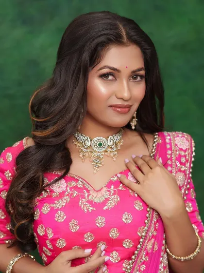 This is a beautiful example of the soft, glowing party makeup look we create in our professional courses. Notice the seamless base, the defined yet natural eyes, and the perfect lip shade that completes the look.