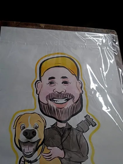 Yes, I draw pets too. This was a special commissioned piece for a client in Ireland, featuring him with his beloved dog, drawn from a photo he sent me.