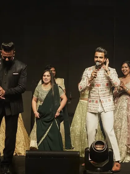Leading a fun, interactive segment with the entire family on stage. It's all about creating collective memories of joy and laughter.