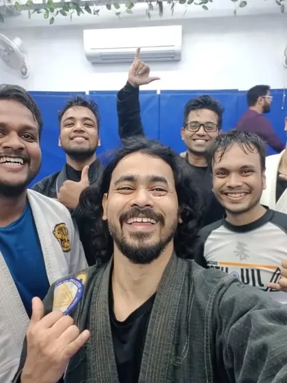 A group of dedicated students after a Gi class, showing their commitment to the art.