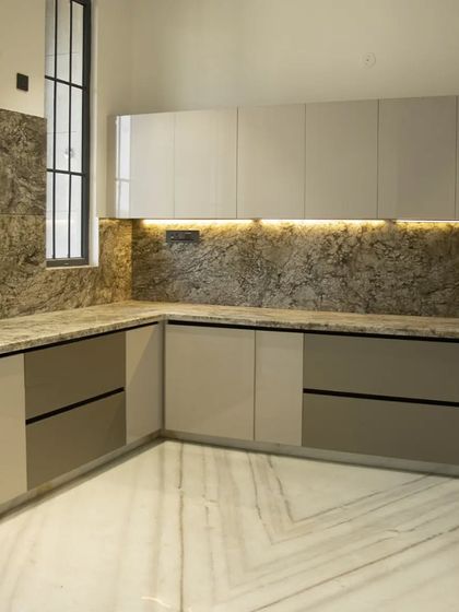 The final view of the proposed kitchen design, highlighting the under-cabinet lighting which adds warmth and provides excellent task lighting for the countertop.