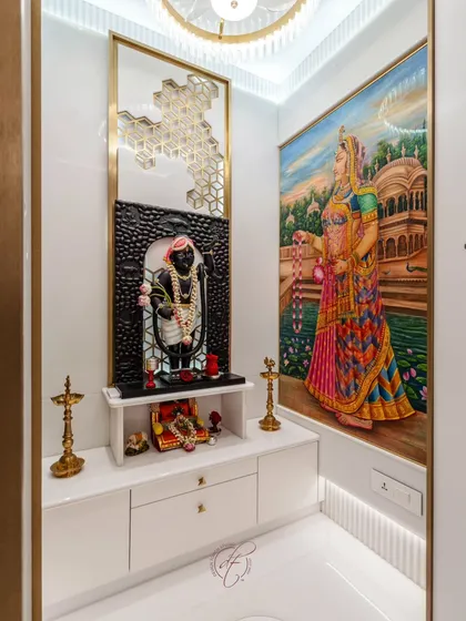 The other side of the mandir features another beautiful painting of Radha ji, creating a symmetrical and harmonious design. The space is illuminated with soft, warm light to create a serene atmosphere.